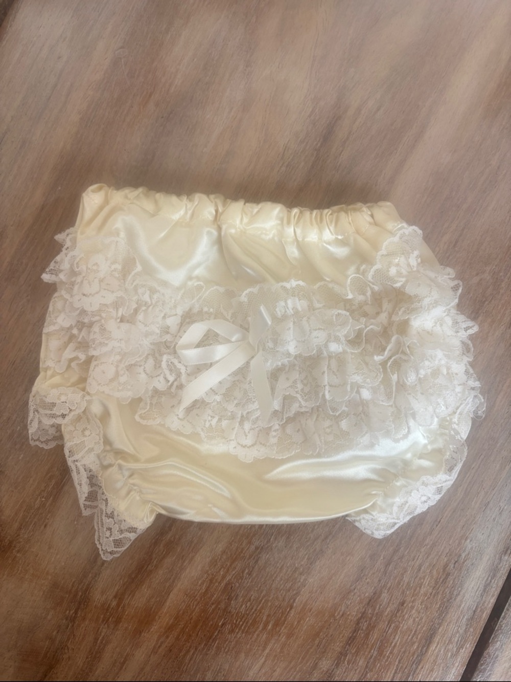 Ivory baby bloomers with lace detail